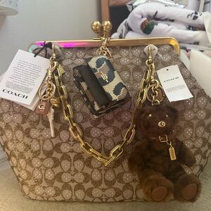 COACH Brown Signature Jacquard Frame Clutch with Gold-Tone Hardware Large